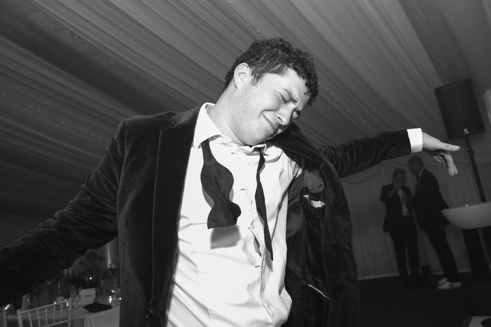 event photographer, guest dancing