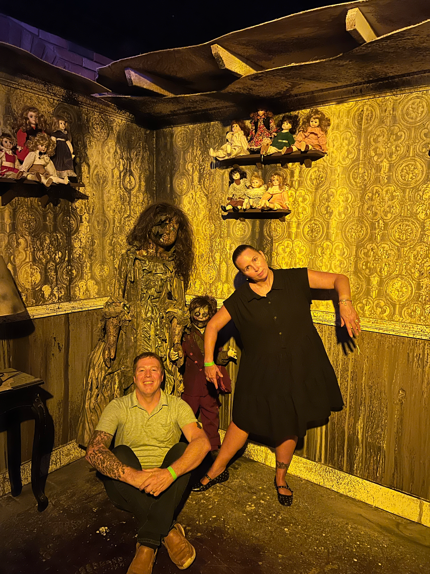 A series of photos showing people posing sideways against a yellow floral wallpapered wall in a quirky indoor setting.