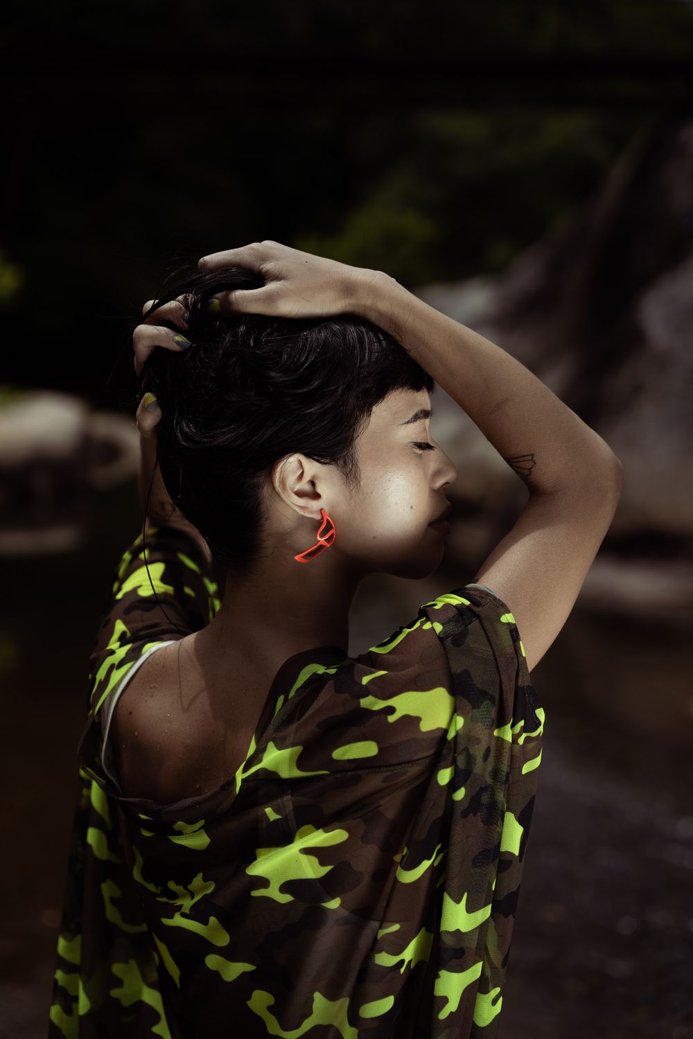 Moody editorial portrait in a Florence park; creative branding for independent designers and labels in Italy.