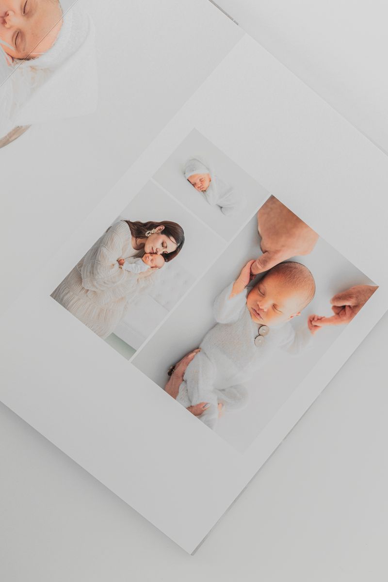 Elegant 10x10 album with 10 spreads, smooth matte paper, oatmeal bookcloth cover, and textured white endleaves for a timeless presentation.