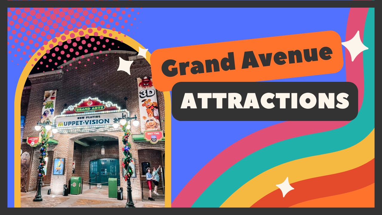 A colorful storefront entrance with Grand Avenue Attractions signage and a rainbow design on the promotional banner.