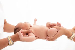 Long Island newborn photographer, Long Island newborn in hands, Nassau county newborn photo shoot, Long Island newborn photos, newborn pics