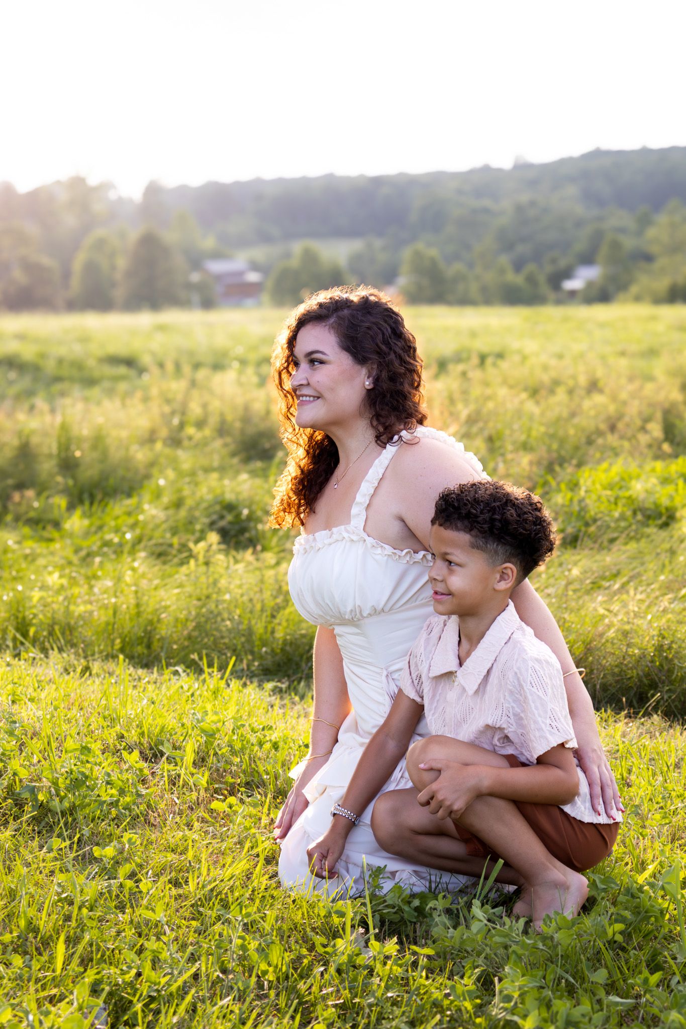 mother and son looking away