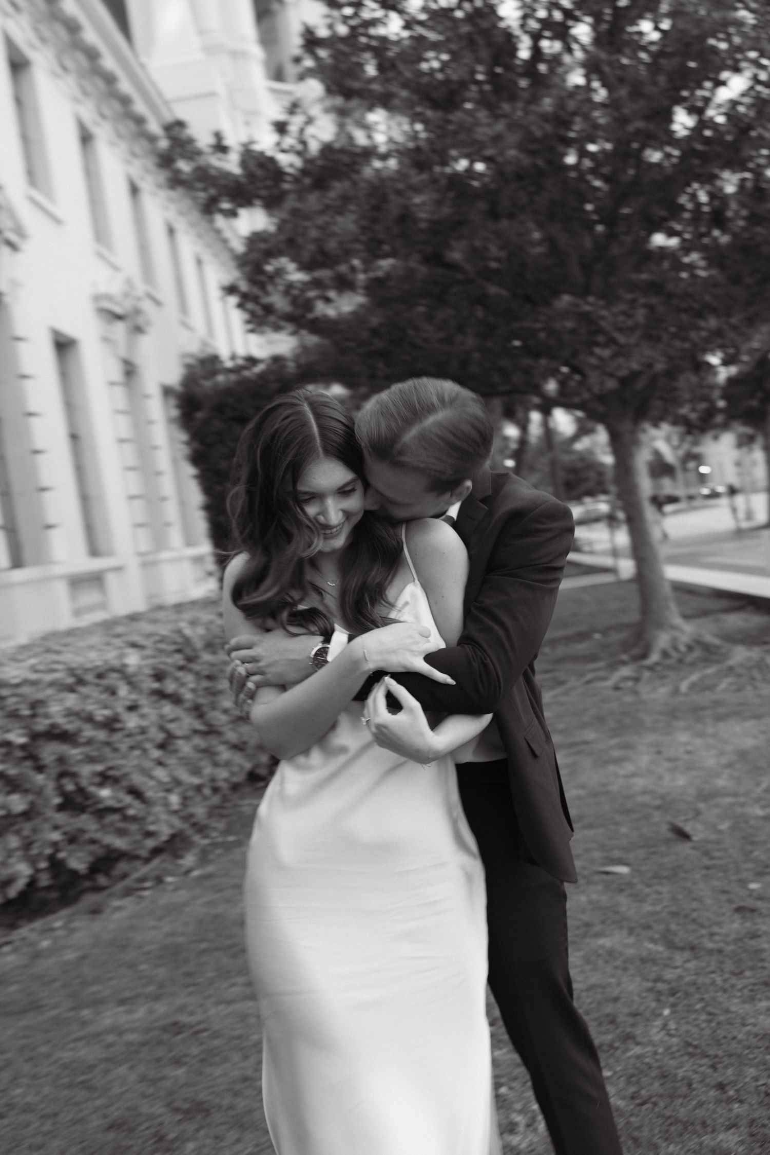 Black and white engagement session at Pasadena City Hall with a timeless, romantic feel