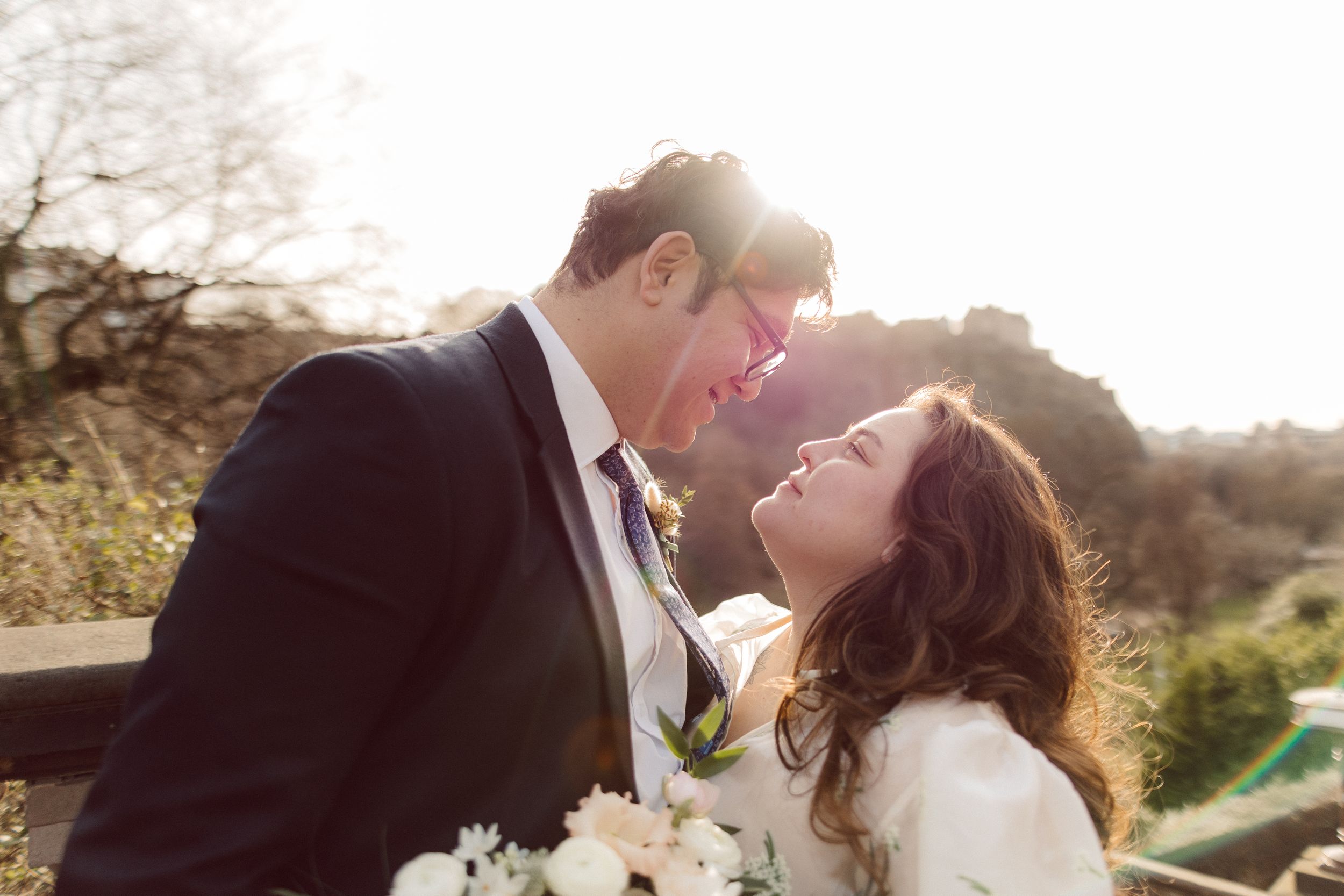 A romantic wedding couple shares intimate kisses in a series of sunset photos with warm golden lighting.