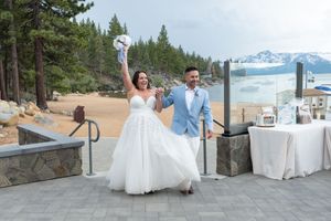 A series of wedding photos showing a couple walking along a scenic beach path with mountains and pine trees in the background.