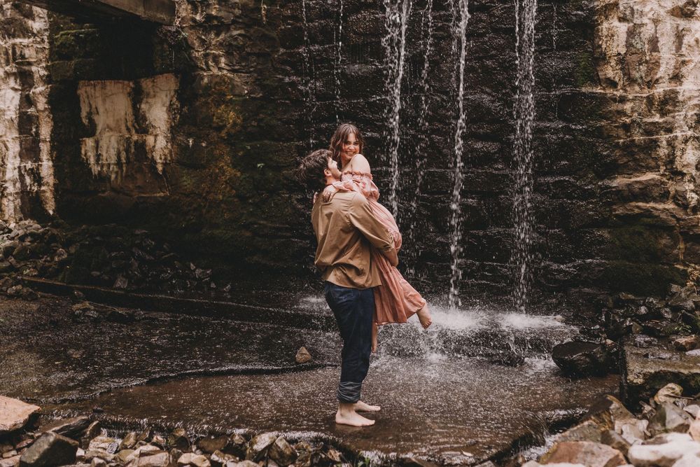 couples adventure session in waterfall and creek in Cullman, Alabama by white Oaks photography a north Alabama photographer - elopement