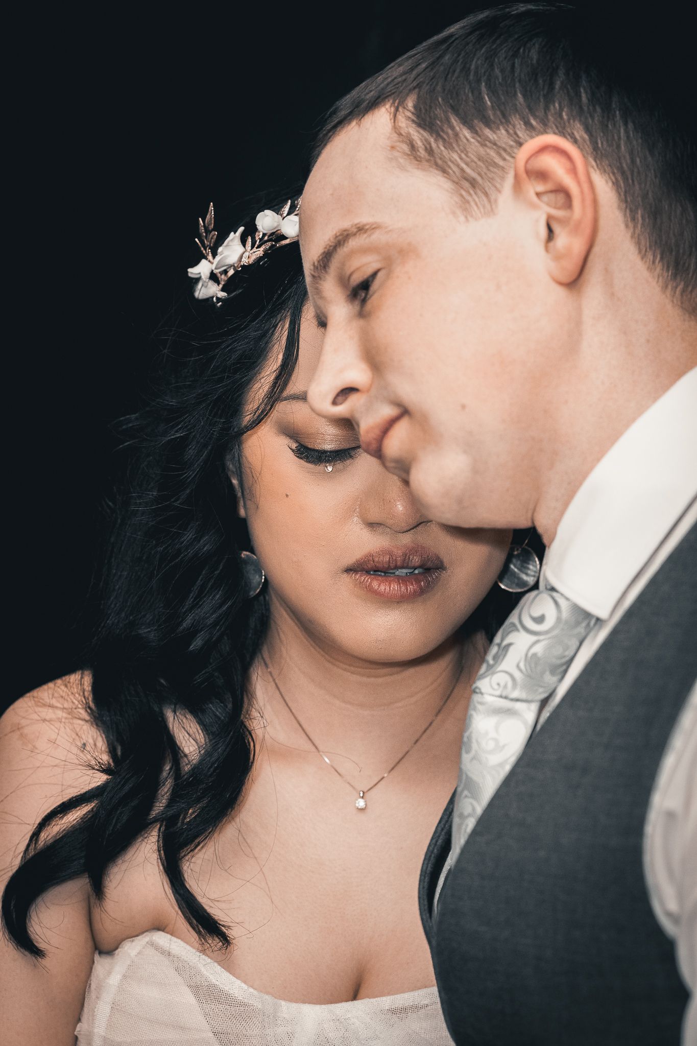 Memories captured as a bride and groom remember those who could not be there at their wedding in Danson House Bexley