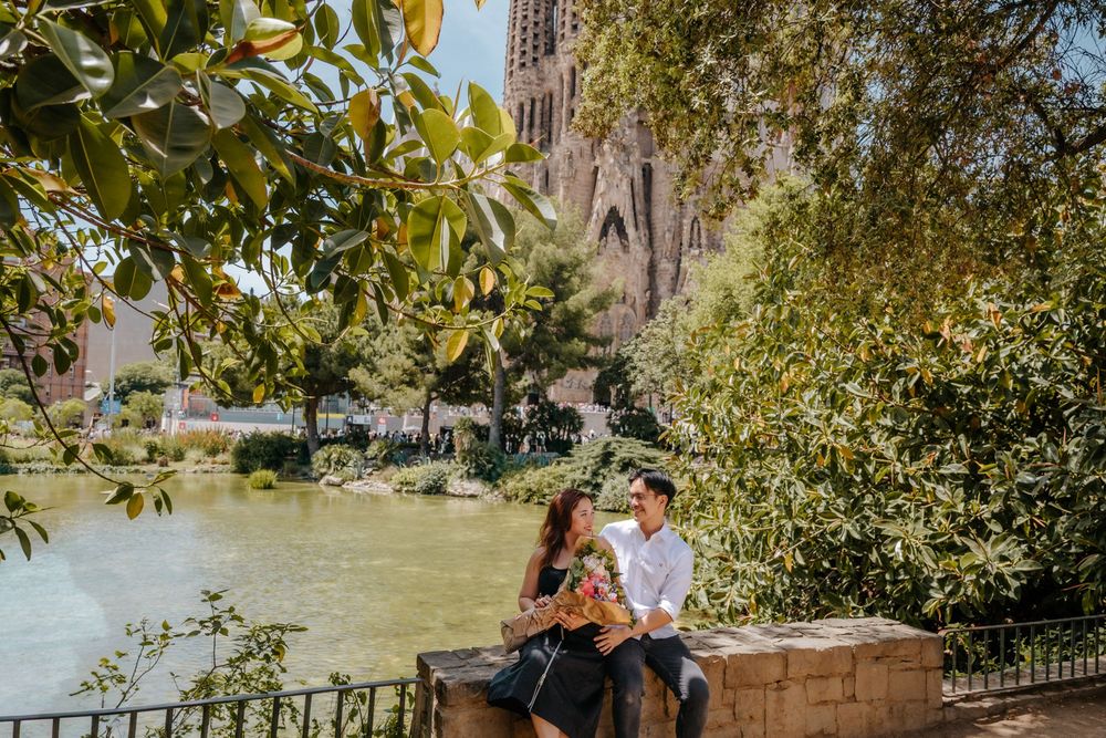 Couple embracing joyfully after the proposal in Barcelona.