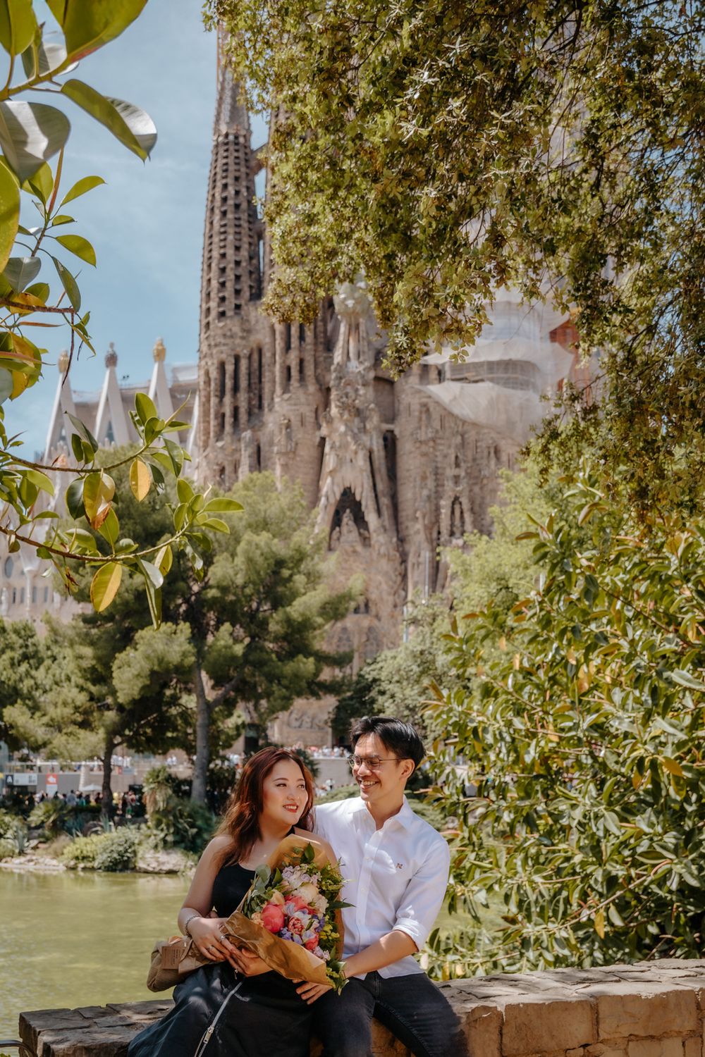 Michael proposing to Erika in front of Sagrada Familia during a magical morning.