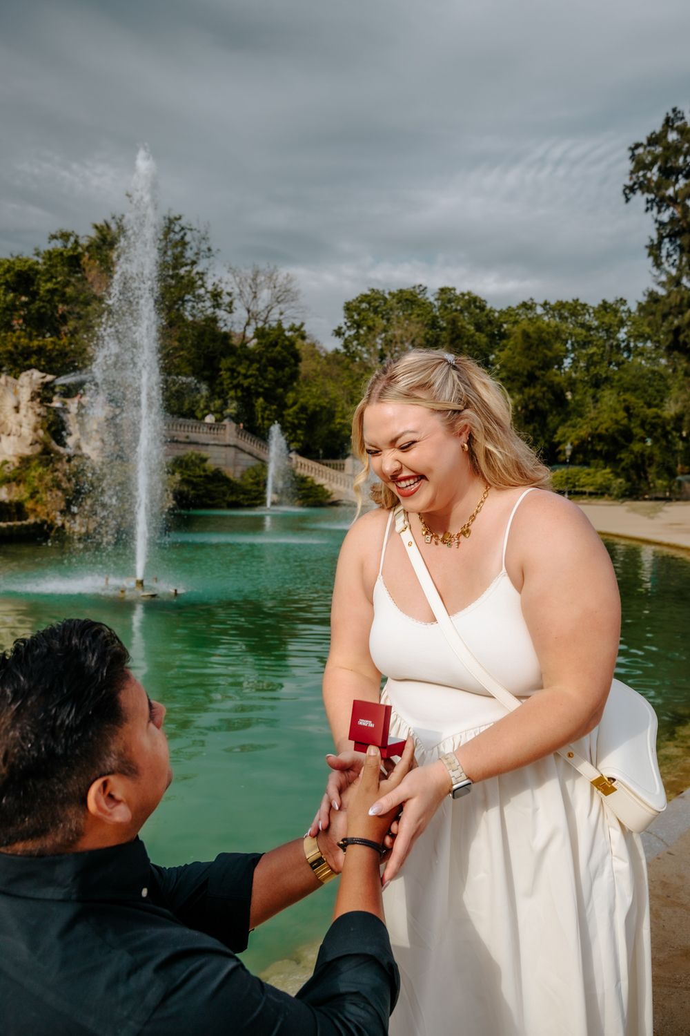 Chelsea’s happy expression while Daniel hugs her tightly.