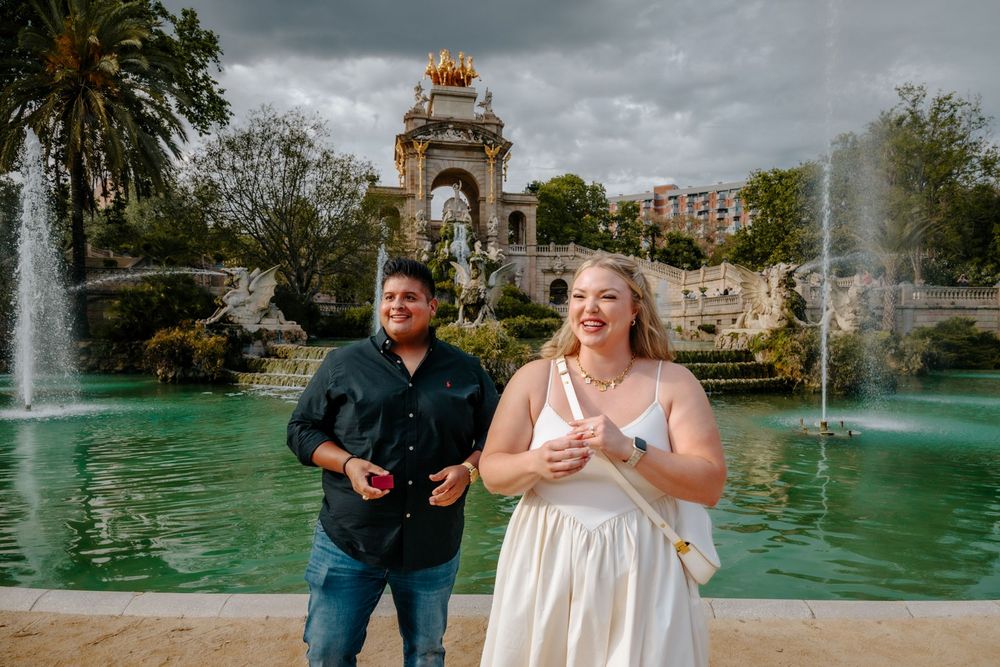 Couple celebrating their engagement with pure joy.