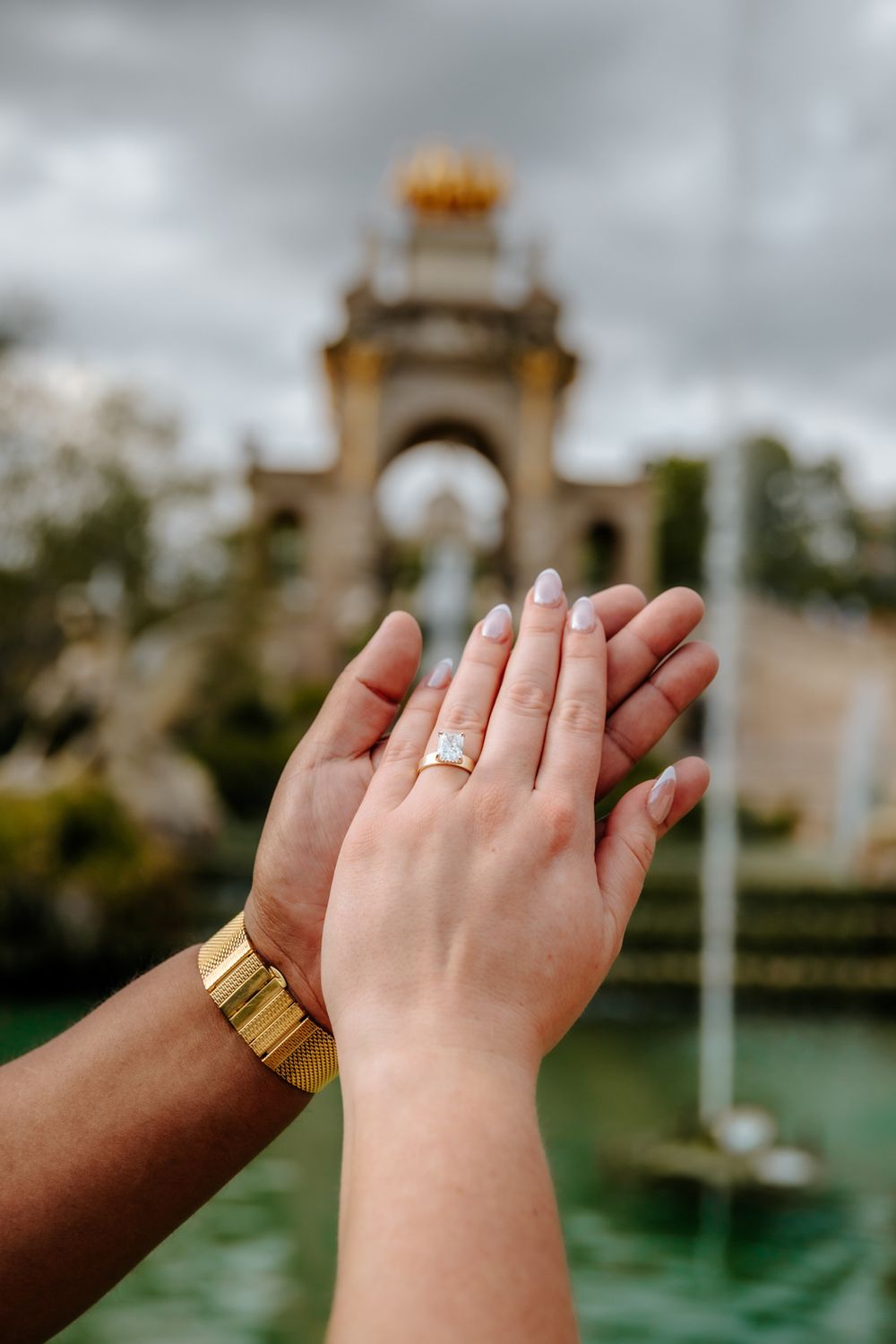 Close-up of Chelsea’s engagement ring shining in the sunlight.