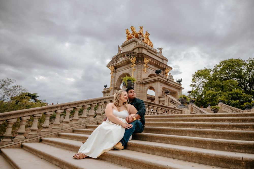 Surprise proposal moment as Daniel kneels with a ring in hand.