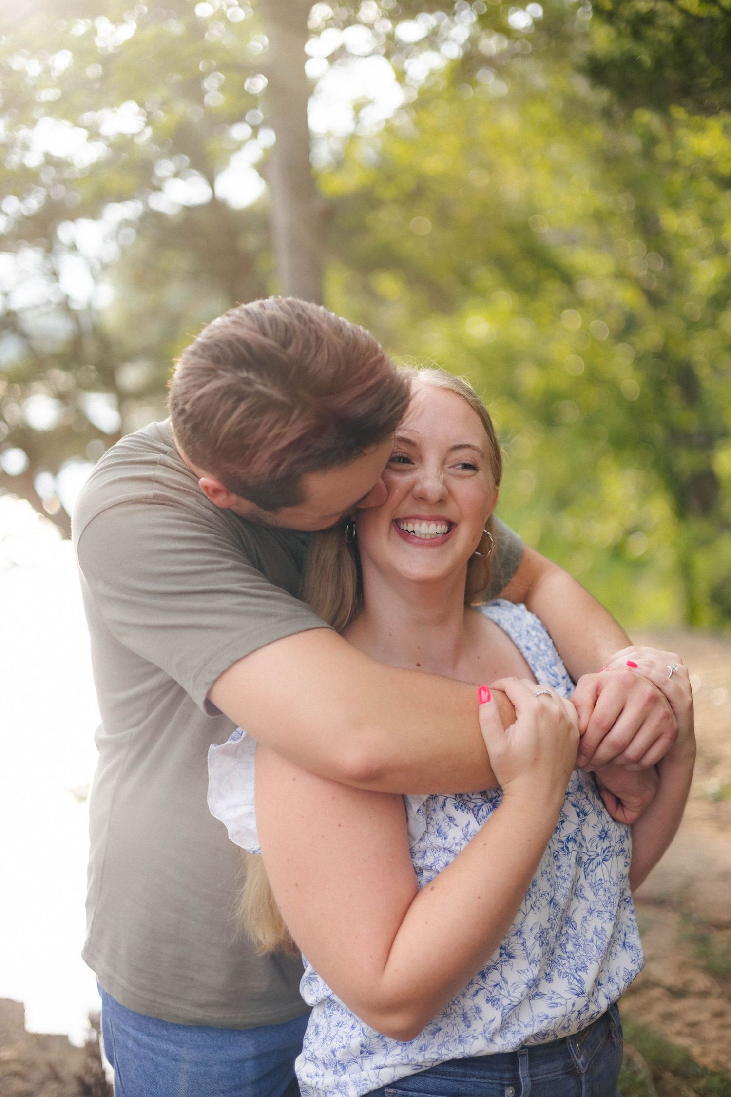 outdoor summer lakeside engagement photos in Kankakee, Illinois