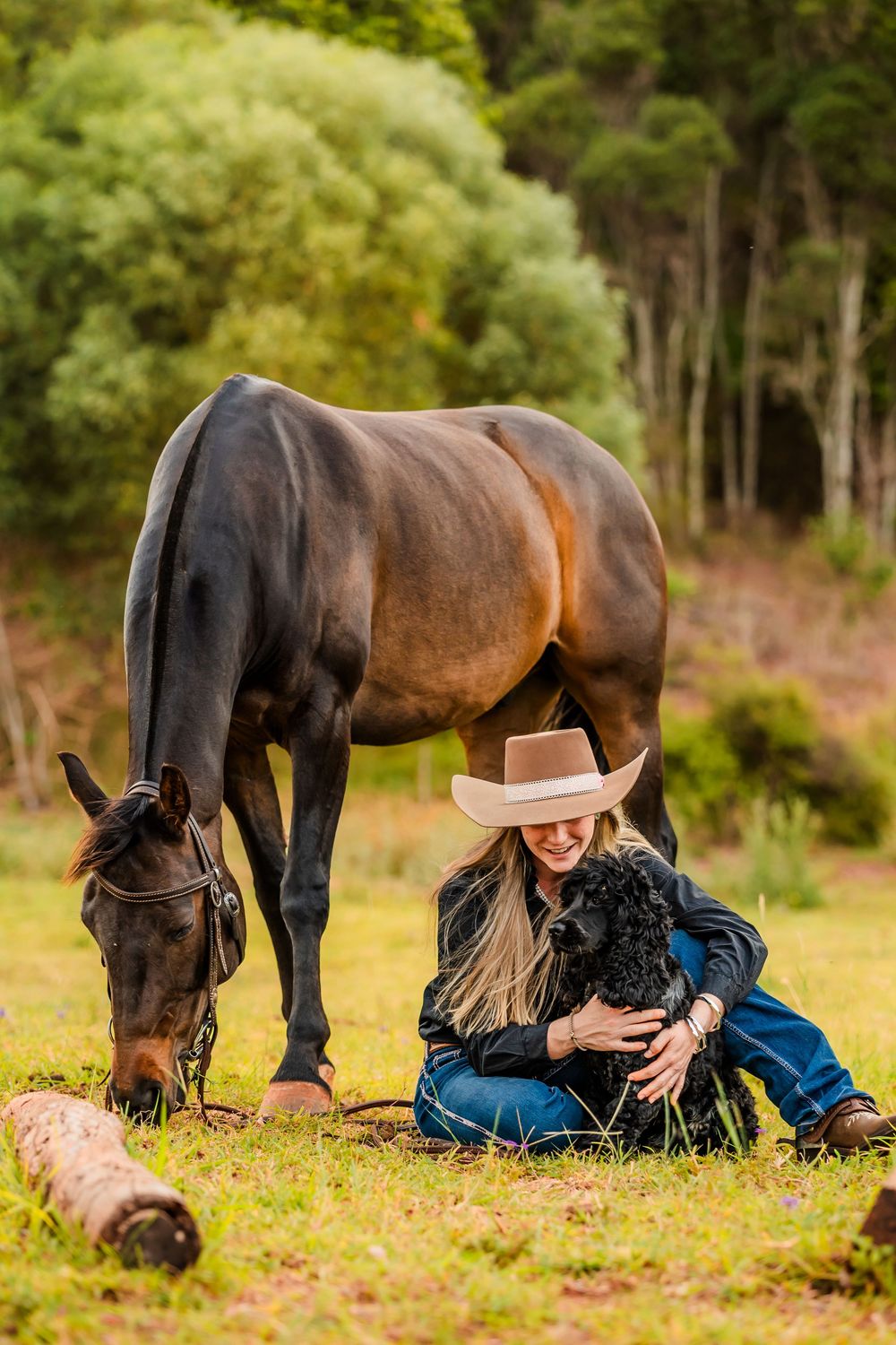 A sequence of photos showing a horse grazing in a field while someone rests on the ground nearby.