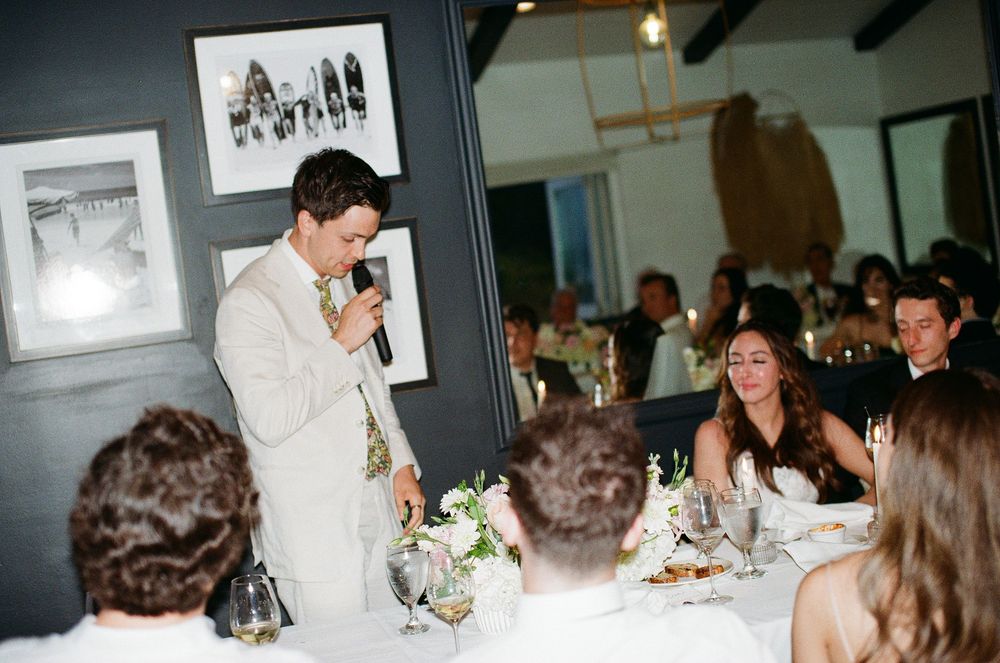 Malibu film photographer capturing the best man’s toast on 35mm film during an intimate reception.
