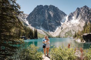 Scenic mountain lake view at Colchuck Lake proposal with turquoise waters and jagged peaks in the Cascade Range.