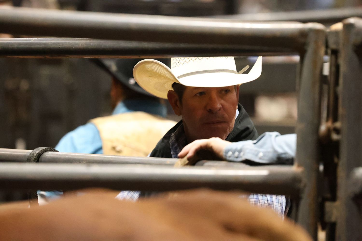 Behind the chutes getting ready for his retirement ride. Bronc Rider