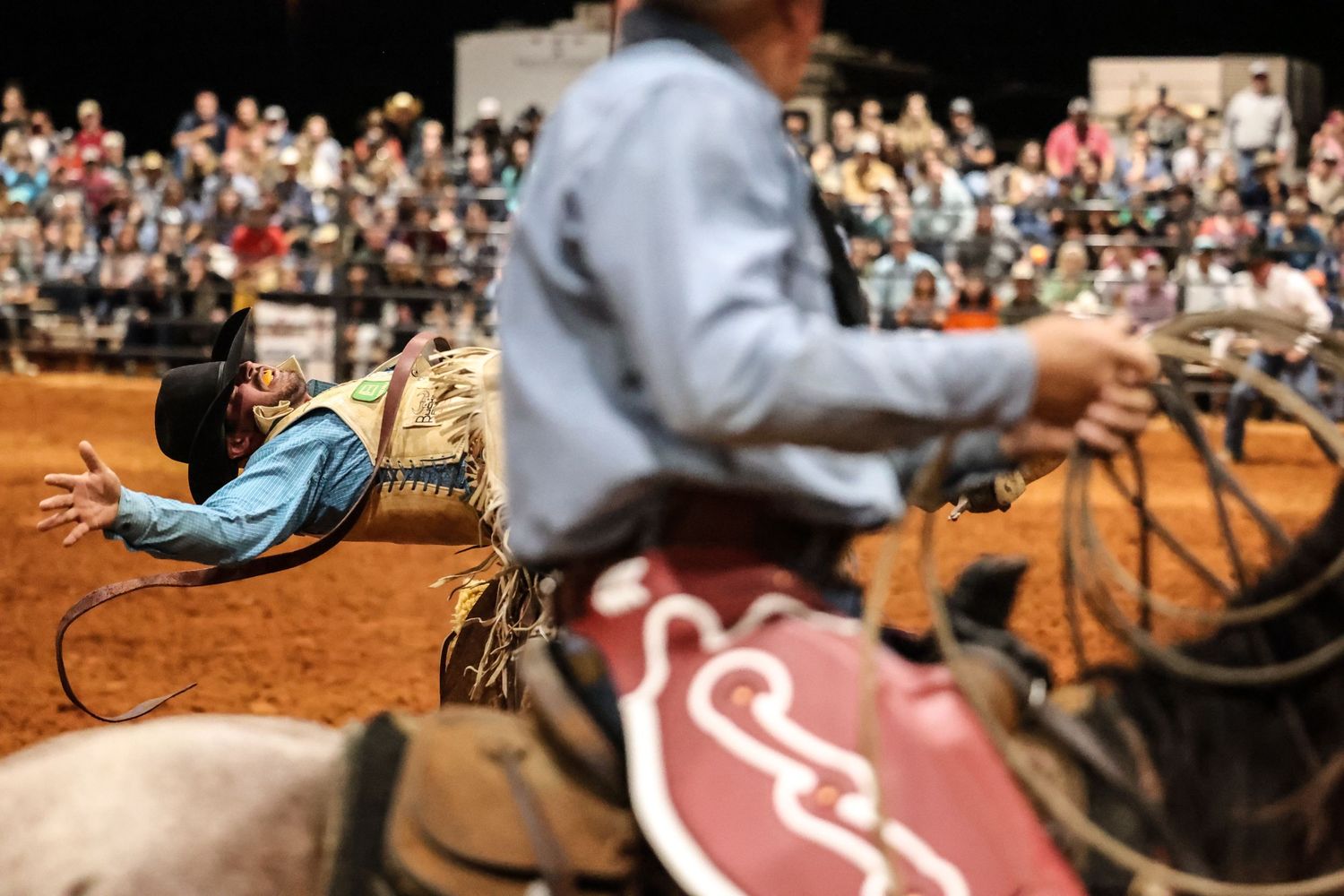 Behind the chutes getting ready for his retirement ride. Bronc Rider