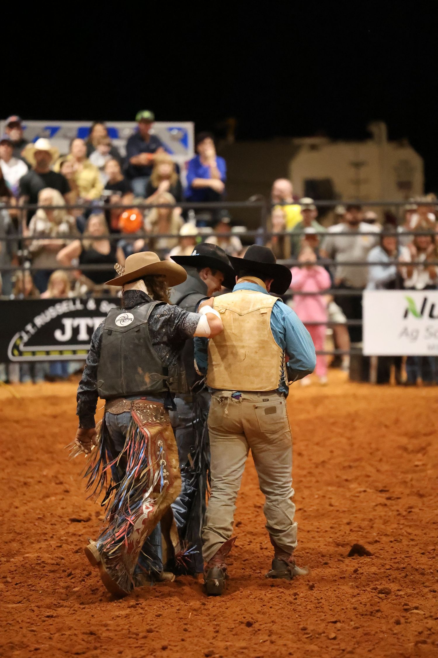 Behind the chutes getting ready for his retirement ride. Bronc Rider