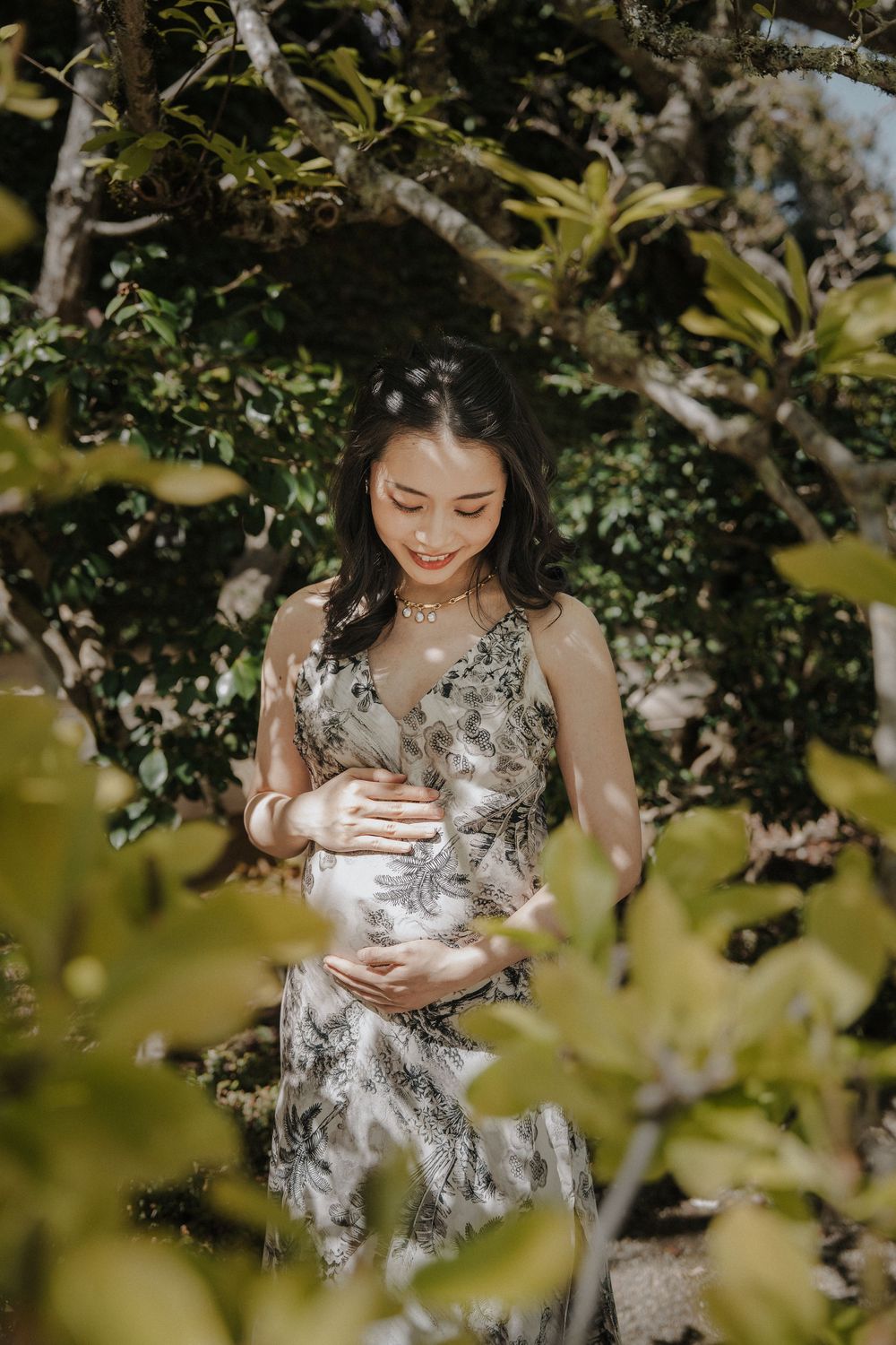 Artistic outdoor photography among blooming trees and natural foliage.