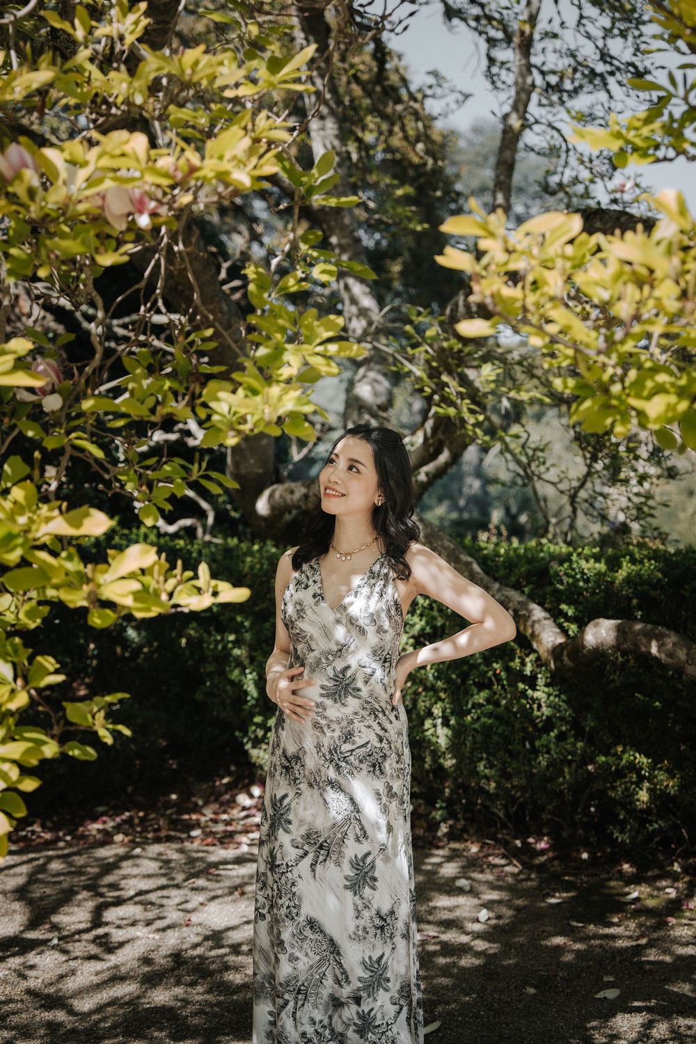 Joyful moments captured in a garden setting with golden afternoon light.