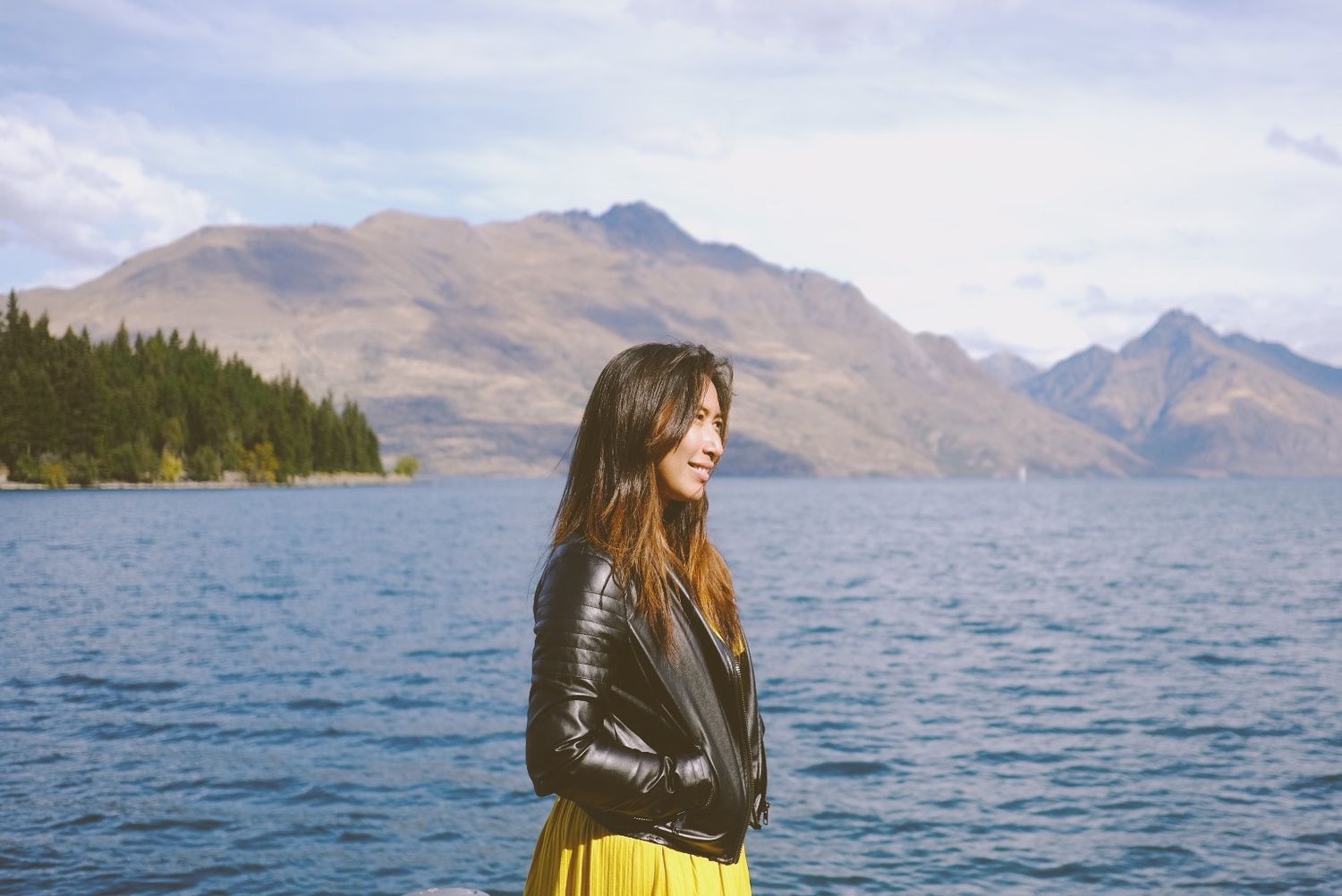 Scenic mountain lake views with blue water and rugged peaks in the background.