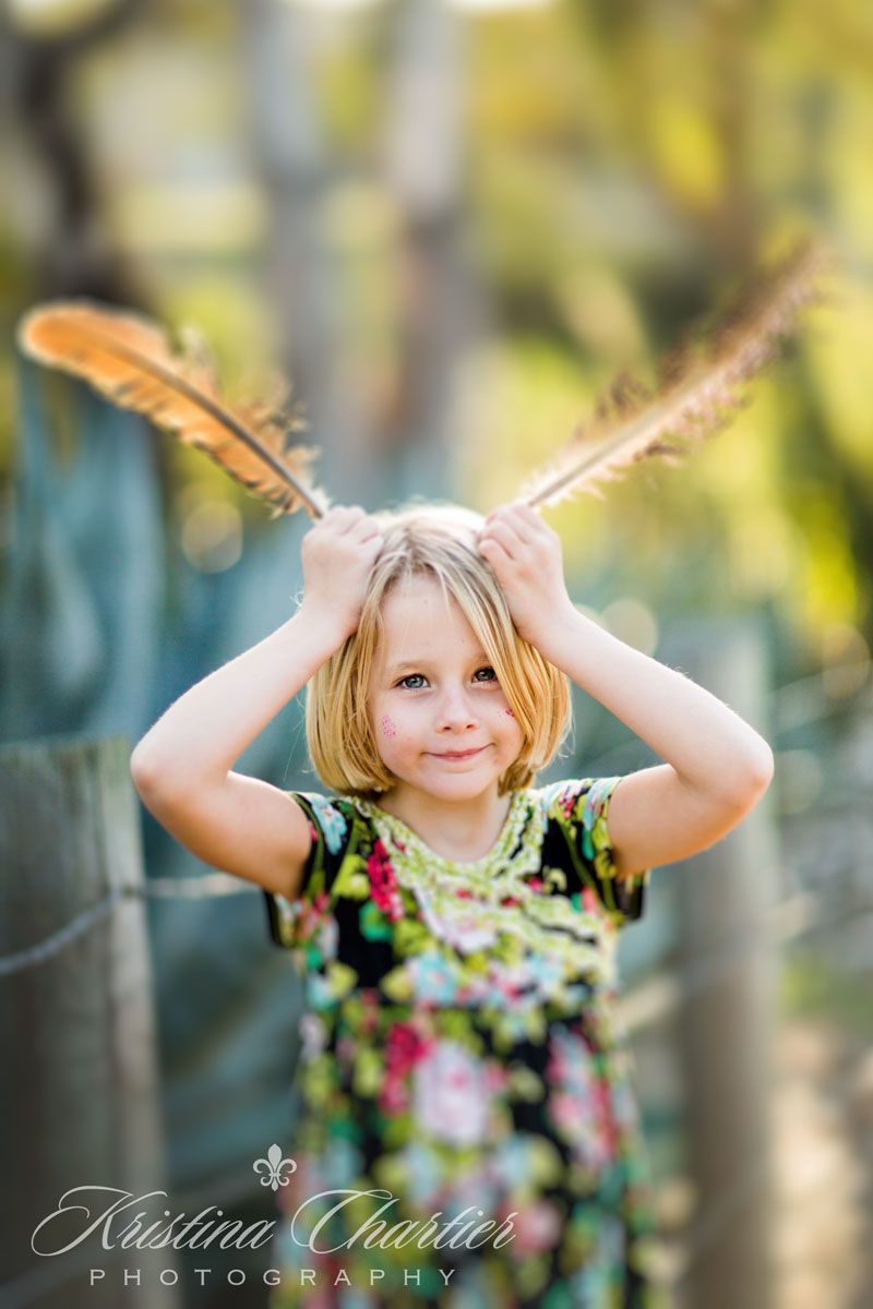 Playful artistic photo sequence shows hands making silly gestures against soft bokeh outdoor garden background.