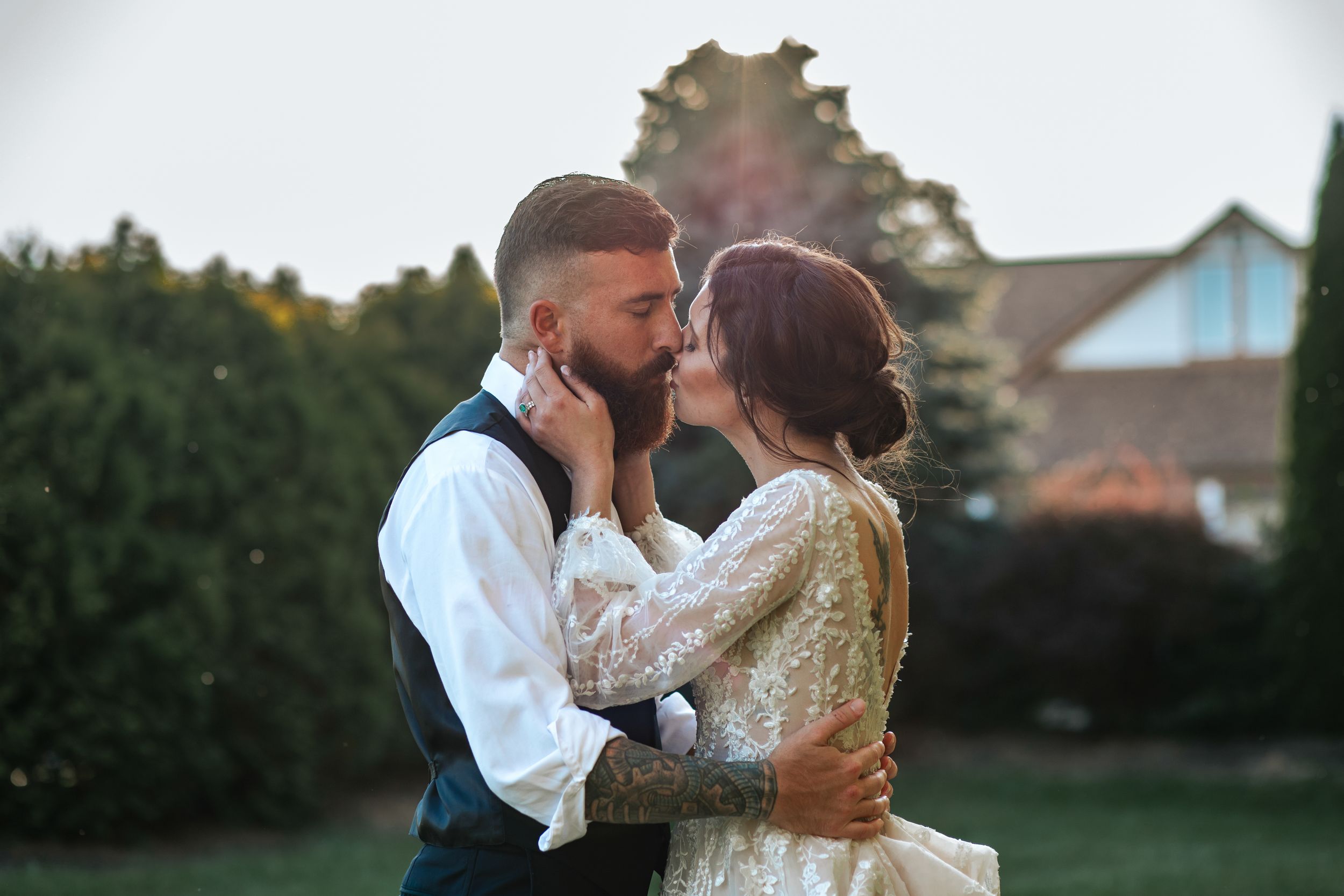 Couple performs romantic dance moves during their sunset wedding photoshoot.