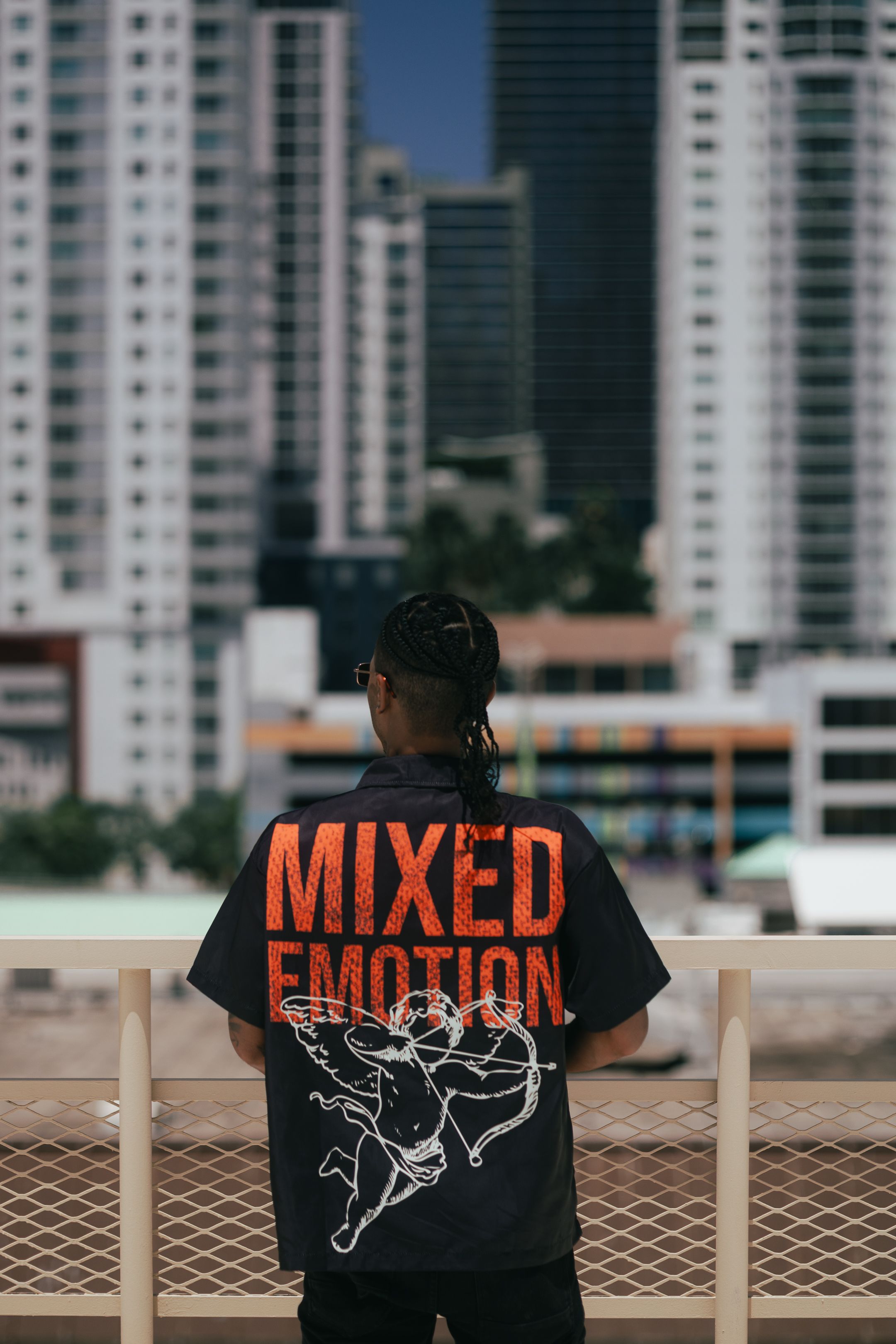 Cinematic streetwear brand photography in Miami featuring urban fashion and city skyline storytelling by MannyPortraits.