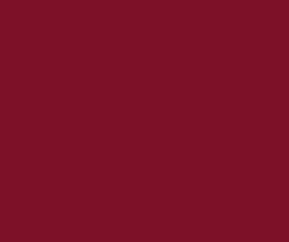A solid burgundy red colored background texture with a rich wine-like hue.
