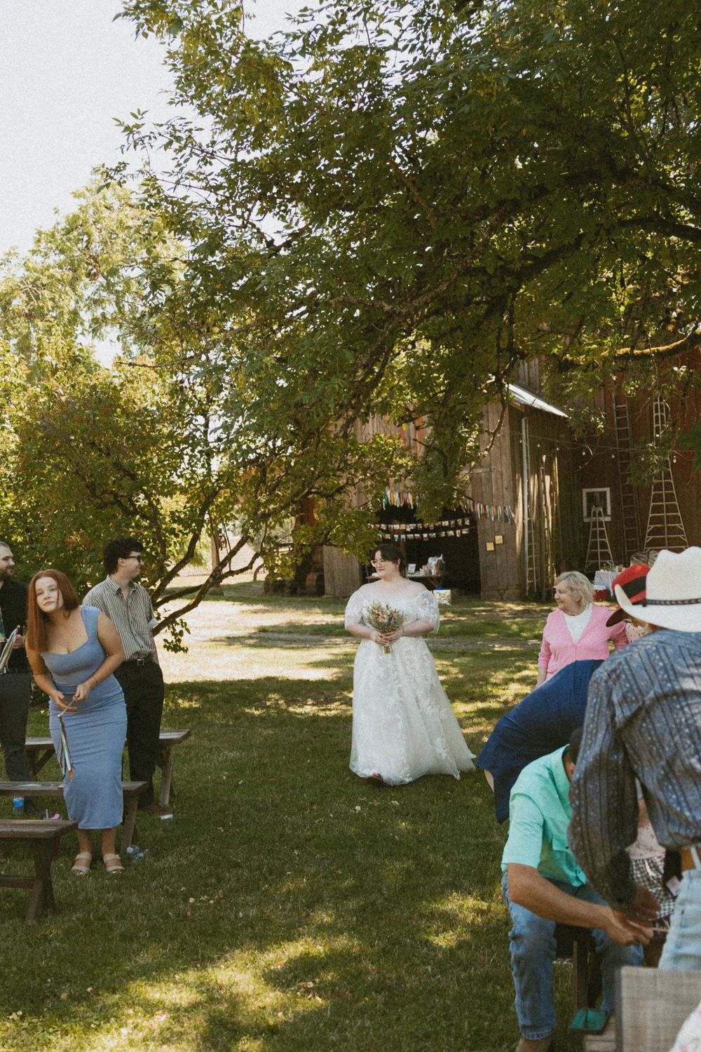 A sequence of outdoor wedding dance photos showing couples dancing in a backyard garden setting under trees.