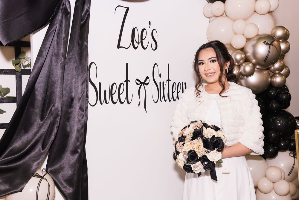 Elegant black and white wedding photo collage with romantic balloon decorations and floral arrangements.