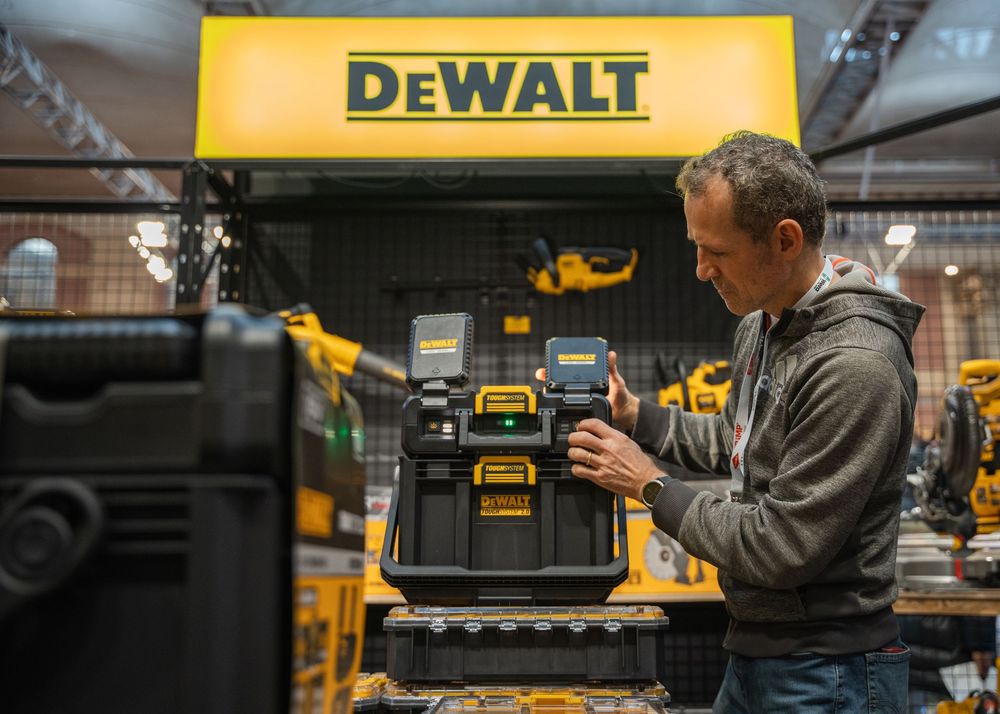 DeWalt branded power tools and equipment displayed with yellow branding elements.