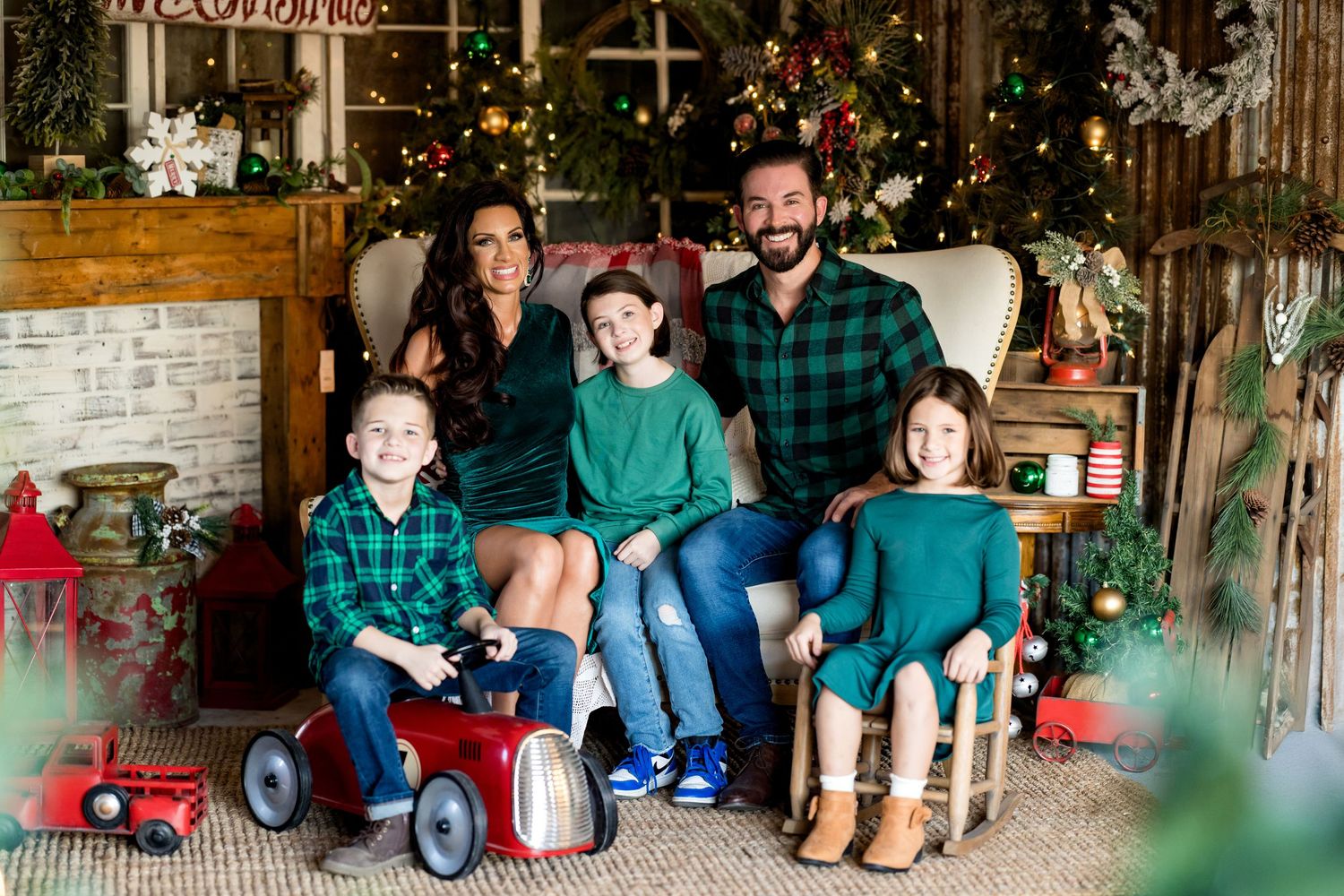 A series of holiday family portraits taken in a rustic indoor setting with Christmas decorations and festive lighting.