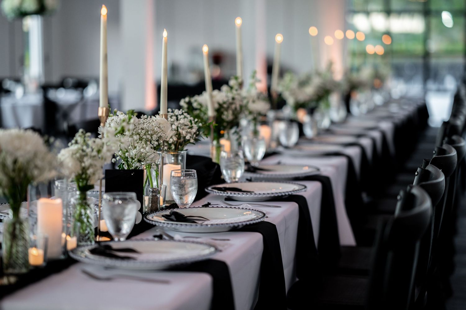 Reception table decor captured by luxury wedding photographers in Florida.