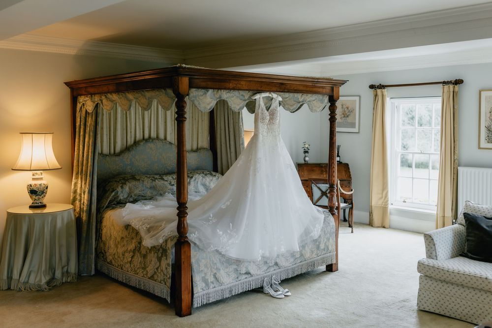 Elegant bridal suite at Birtsmorton Court with four-poster bed