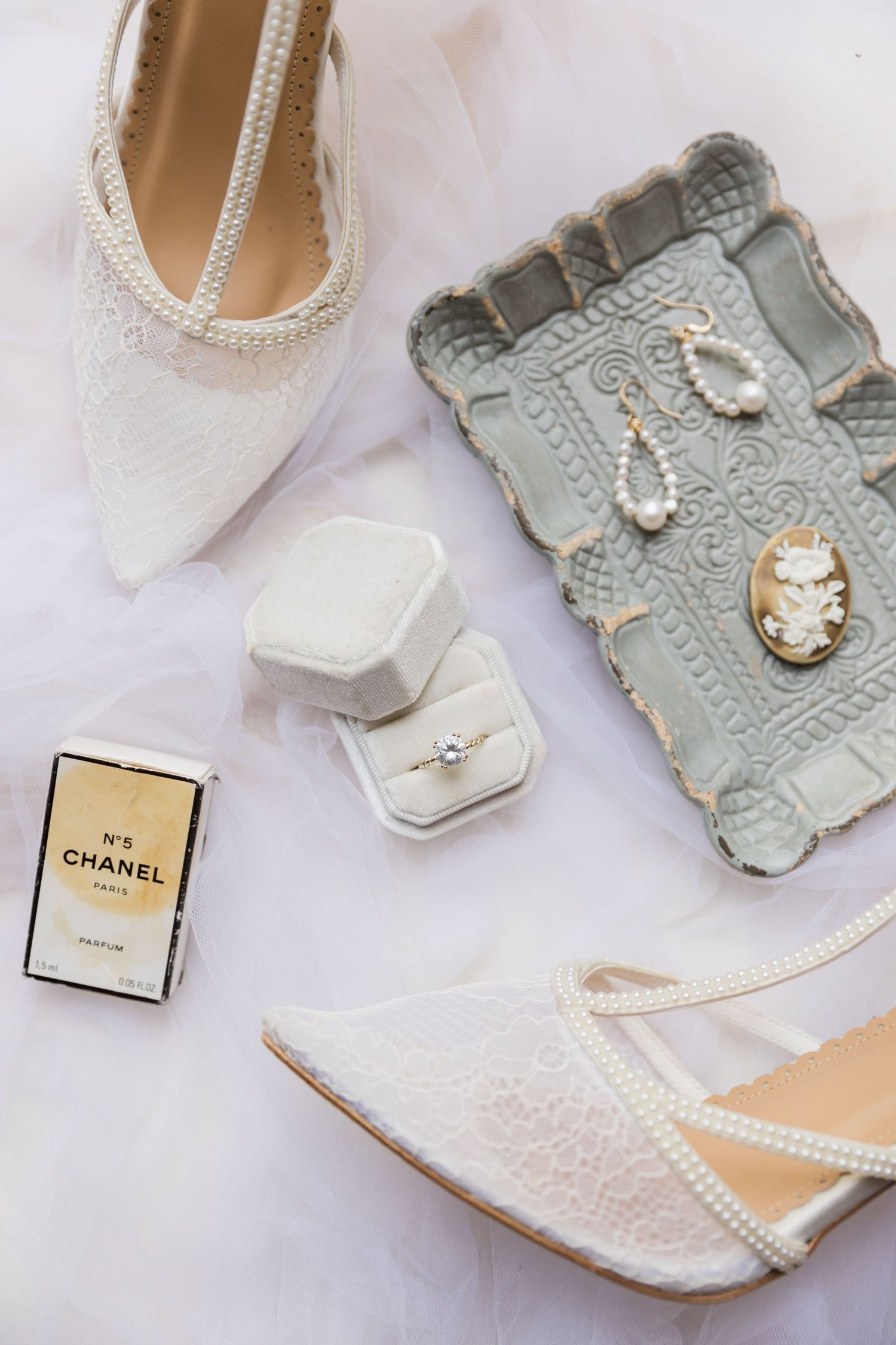 A sequence of wedding dress photos in a vintage green room with ornate ceiling medallions and floral carpeting.