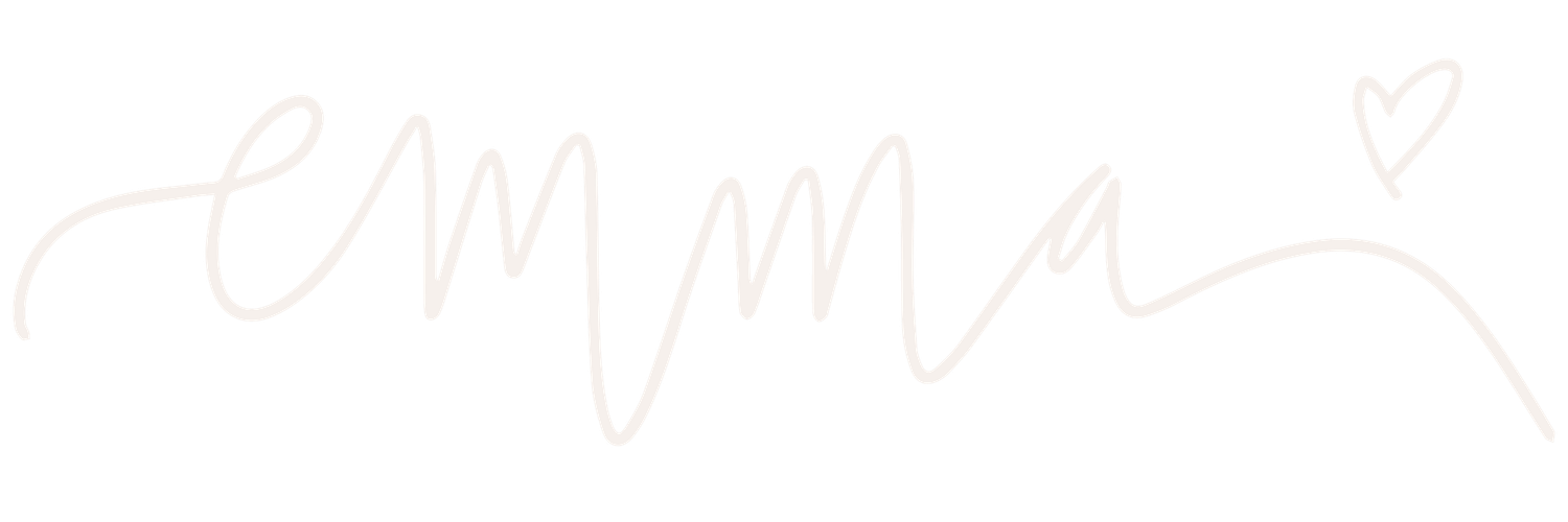 Black handwritten text on white paper shows "Emma" with heart doodles and decorative flourishes.