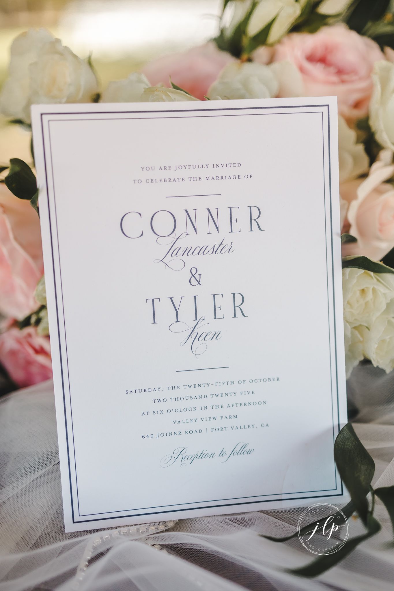 Formal wedding invitation featuring classic typography and elegant border design.