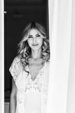 A series of elegant bridal portraits showing soft lighting and romantic styling.