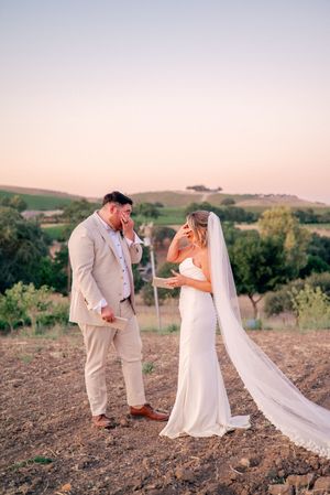 Candid wedding photos captured on hillside during golden hour.
