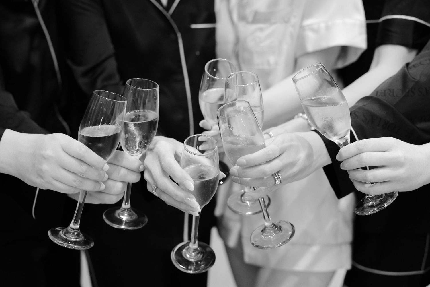 Bride toasting with bridesmaids at BallenIsles Country Club in Palm Beach during a wedding photographed by Ohio photographer Tom Forrest.