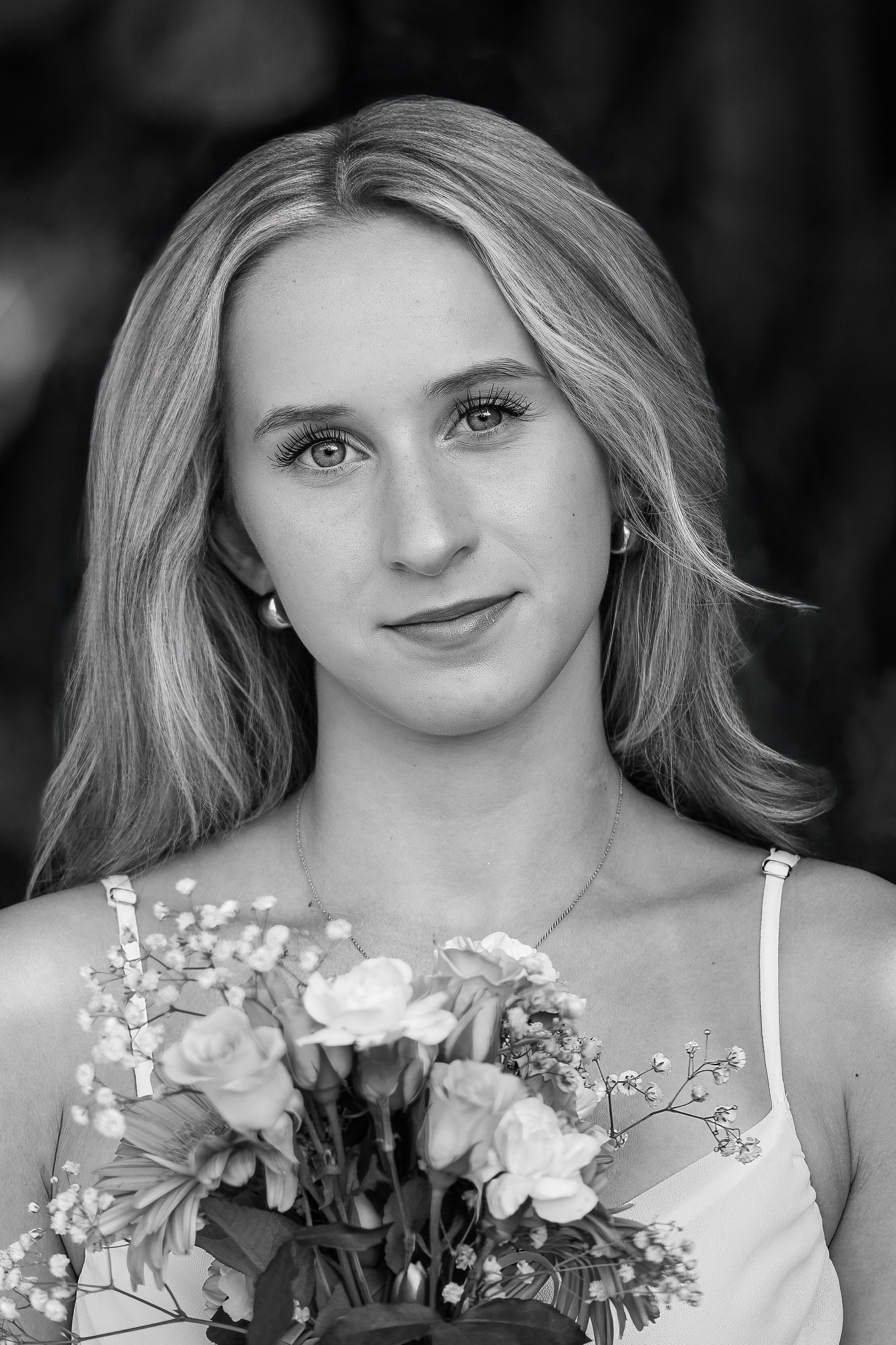 Amelia, senior and high school graduate client, posing for individual portraits in DuBois Park, Jupiter, Florida of Palm Beach County