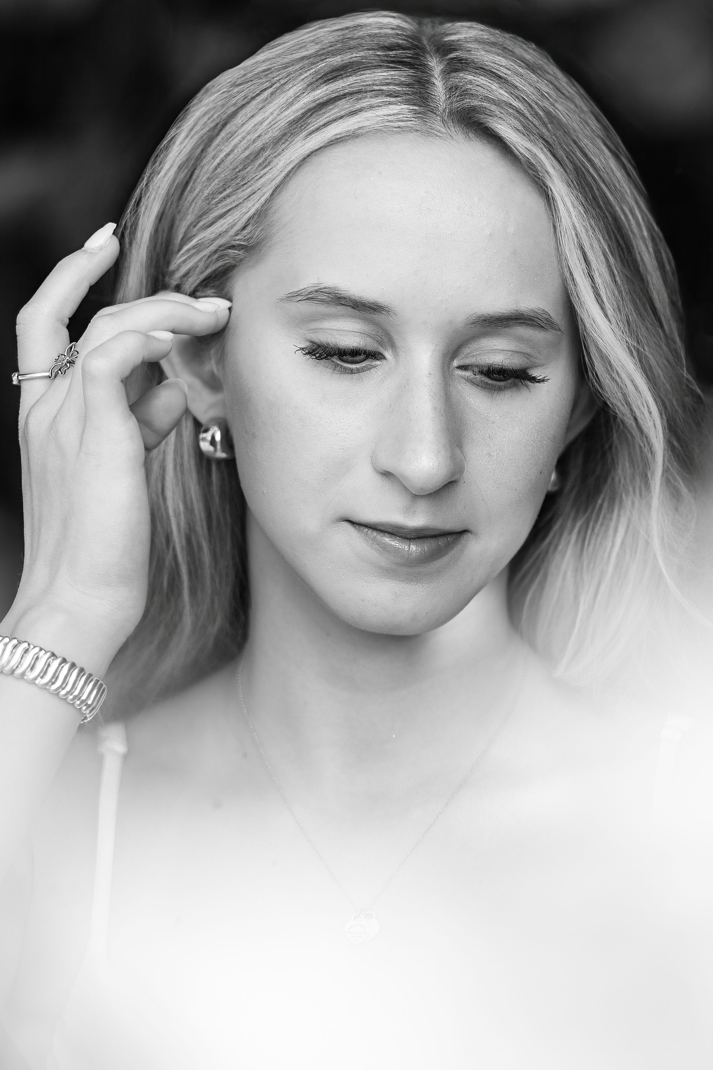 Amelia, senior and high school graduate client, posing for individual portraits in DuBois Park, Jupiter, Florida of Palm Beach County