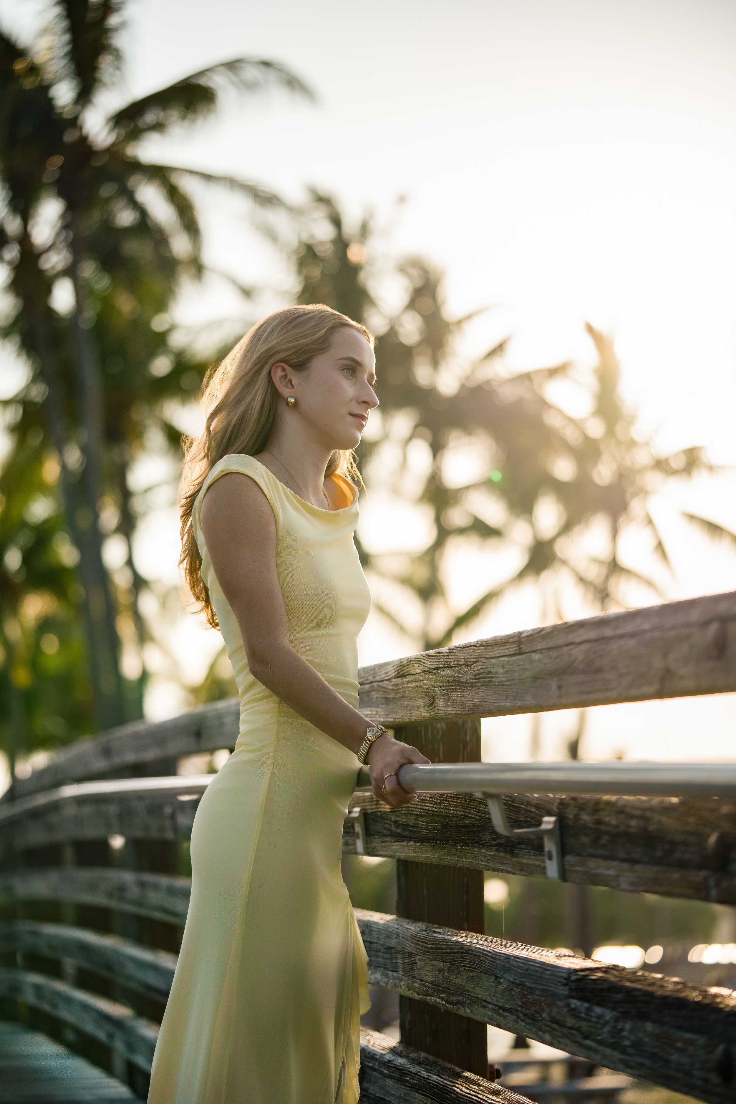 Amelia, senior and high school graduate client, posing for individual portraits in DuBois Park, Jupiter, Florida of Palm Beach County