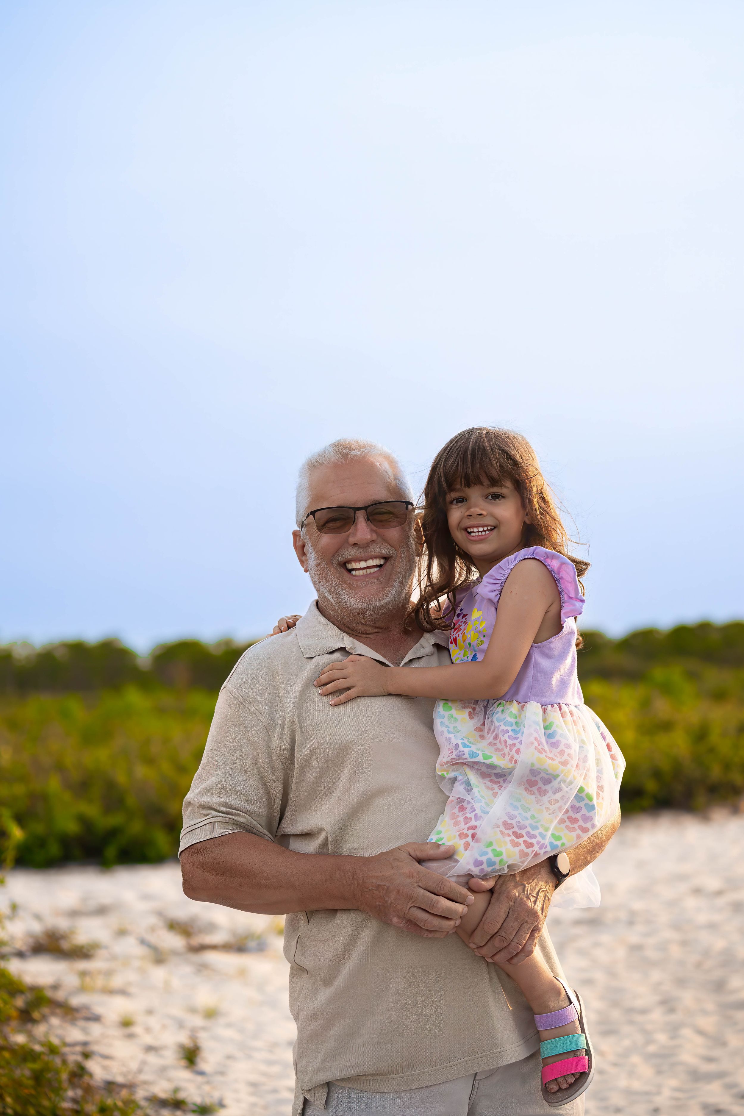 Michael and Evelyn together in juno dunes natural area, juno beach florida, during a family session