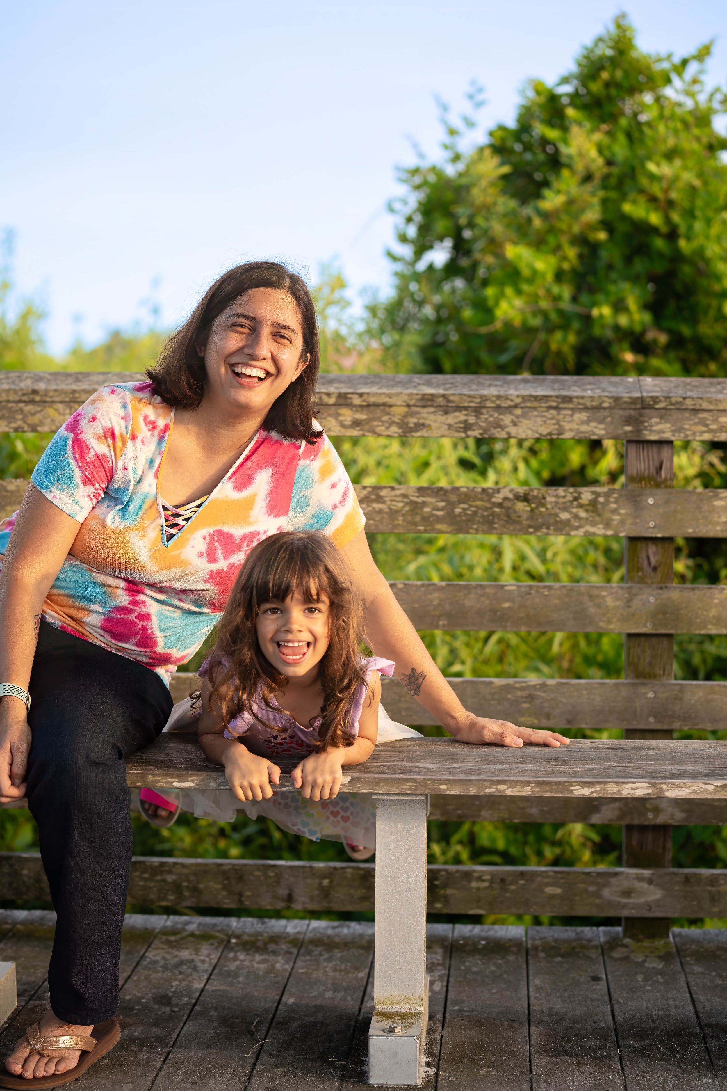 Toni and Evelyn together on the bench of Juno Dunes naural area in juno beach florida