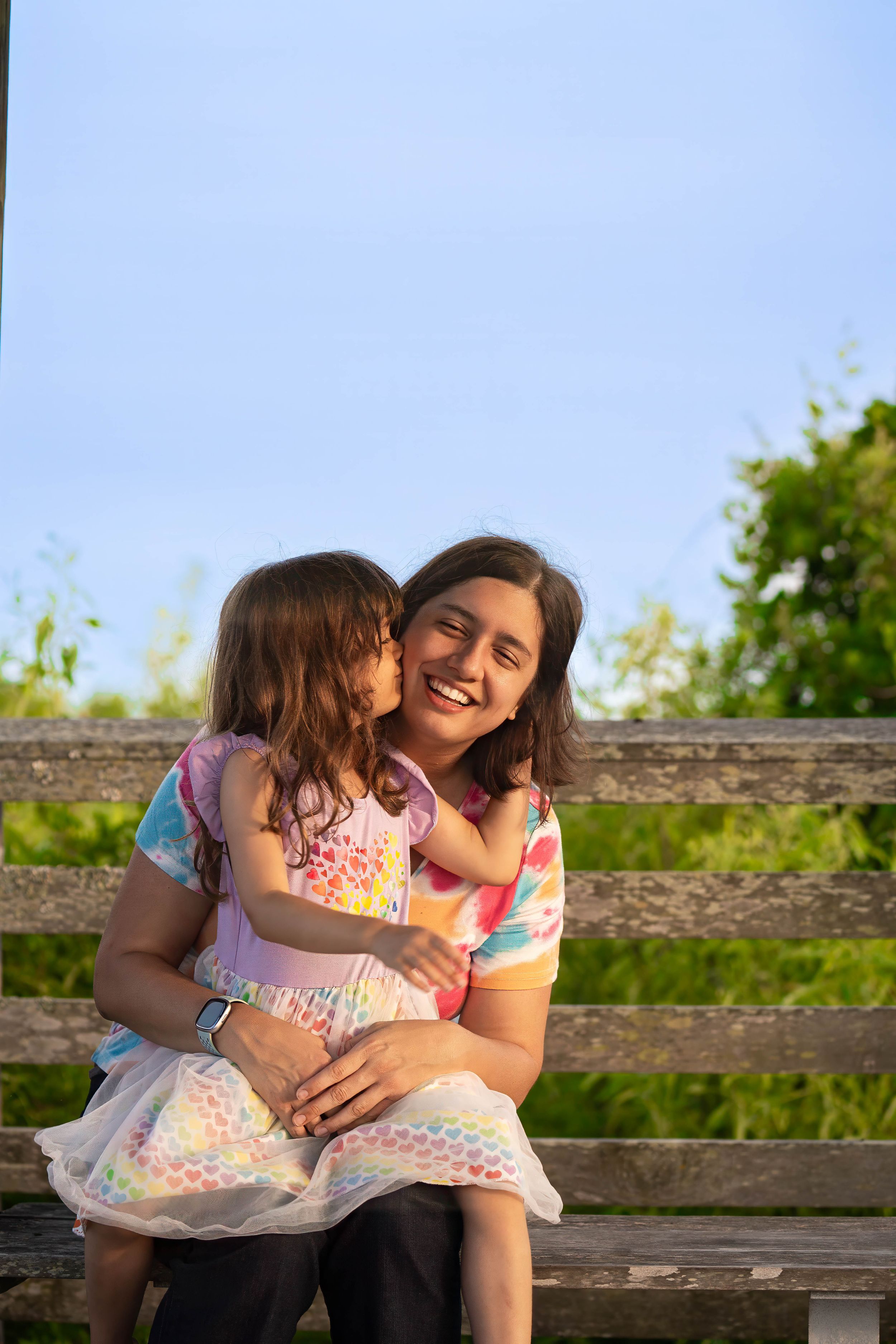 Toni and Evelyn together on the bench of Juno Dunes naural area in juno beach florida
